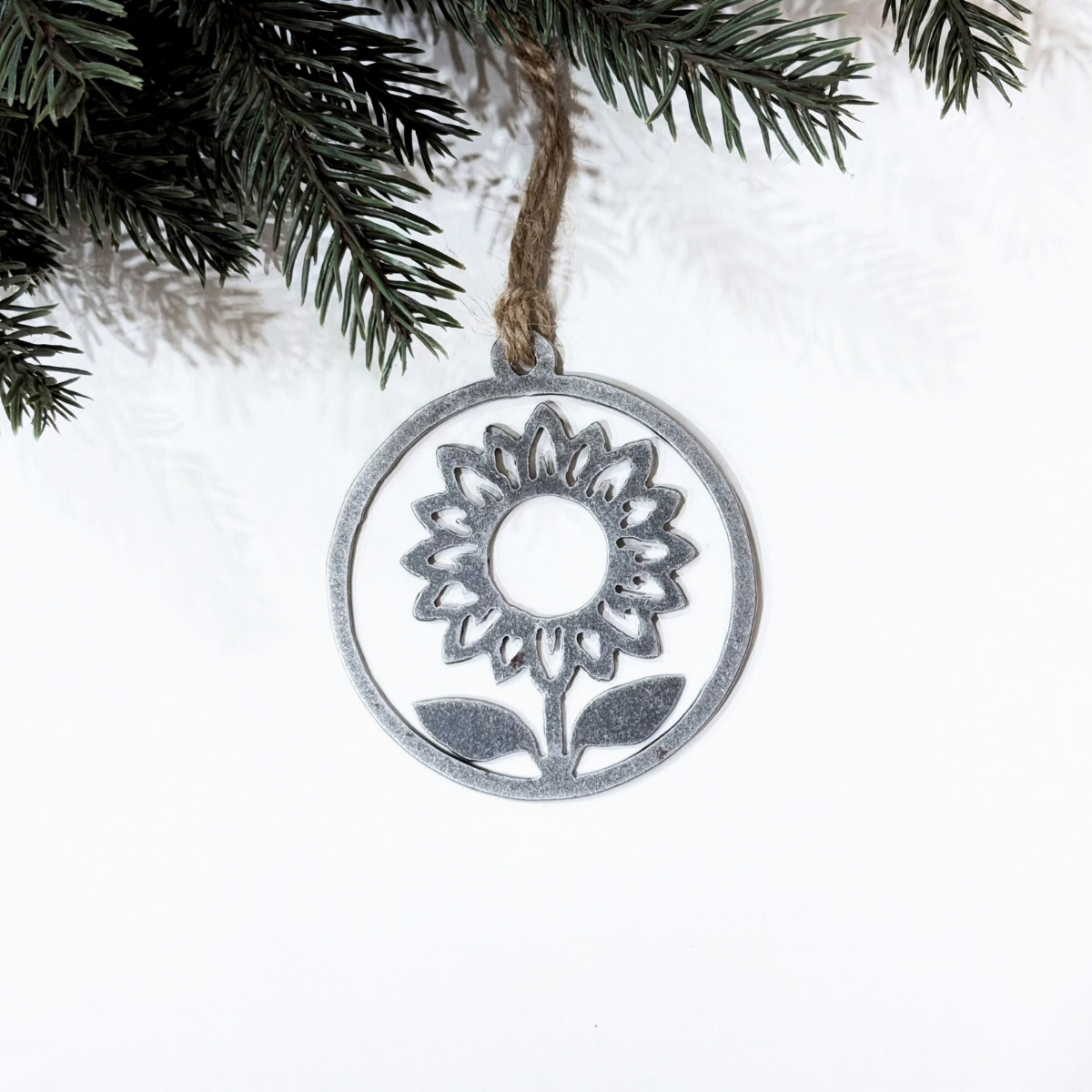 Round sunflower Christmas ornament made from recycled steel