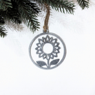 Round sunflower Christmas ornament made from recycled steel